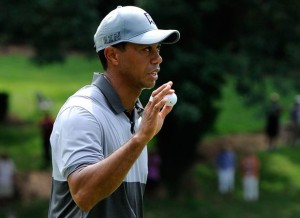 GREENSBORO, NC - AUGUST 22: Tiger Woods reacts after a birdie putt on the fifth green during the third round of the Wyndham Championship at Sedgefield Country Club on August 22, 2015 in Greensboro, North Carolina.   Jared C. Tilton, Image: 256176293, License: Rights-managed, Restrictions: , Model Release: no, Credit line: Profimedia, AFP