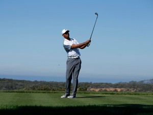 February 5, 2015: Tiger Woods follow through after a tee shot during the first round of the Farmers Insurance Open at Torrey Pines in La Jolla, CA., Image: 217527982, License: Rights-managed, Restrictions: Content available for editorial use, pre-approval required for all other uses., Model Release: no, Credit line: Profimedia, Corbis