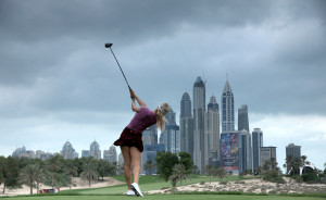 DUBAI, UNITED ARAB EMIRATES - DECEMBER 07: (EDITORS NOTE:Graduated neutral density filter used on this image) Paige Spiranac of the United States in action during her practice round as a preview for the 2015 Omega Dubai Ladies Masters on the Majlis Course at The Emirates Golf Club on December 7, 2015 in Dubai, United Arab Emirates. (Photo by David Cannon/Getty Images)