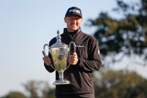 Nov 21, 2016; Sea Island, GA, USA; Mackenzie Hughes celebrates with the trophy after winning the RSM Classic at Sea Island Golf Club - Seaside Course. Mandatory Credit: Logan Bowles-USA TODAY Sports *** Please Use Credit from Credit Field ***, Image: 306416454, License: Rights-managed, Restrictions: *** World Rights ***, Model Release: no, Credit line: Profimedia, SIPA USA