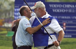 Markus Brier (L) of Austria is congratulated by his caddie Max Zechmann on the 18th green after winning the Volvo China Open at the Silport Golf Club in Shanghai, 15 April 2007. Brier blazed a final-round 67 to claim the 2 million USD Volvo China Open, which is co-sanctioned between the European and Asian Tours, by five shots ahead of Northern Ireland's Graeme McDowell, Australian Scott Hend and Andrew McLardy of South Africa. RESTRICTED TO EDITORIAL USE, Image: 20861599, License: Rights-managed, Restrictions: RESTRICTED TO EDITORIAL USE, Model Release: no, Credit line: Profimedia, AFP